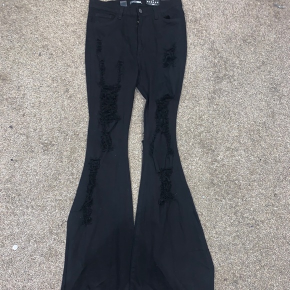 black ripped flare jeans